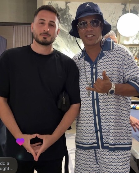 Nicholas Remondos with Ronaldinho
